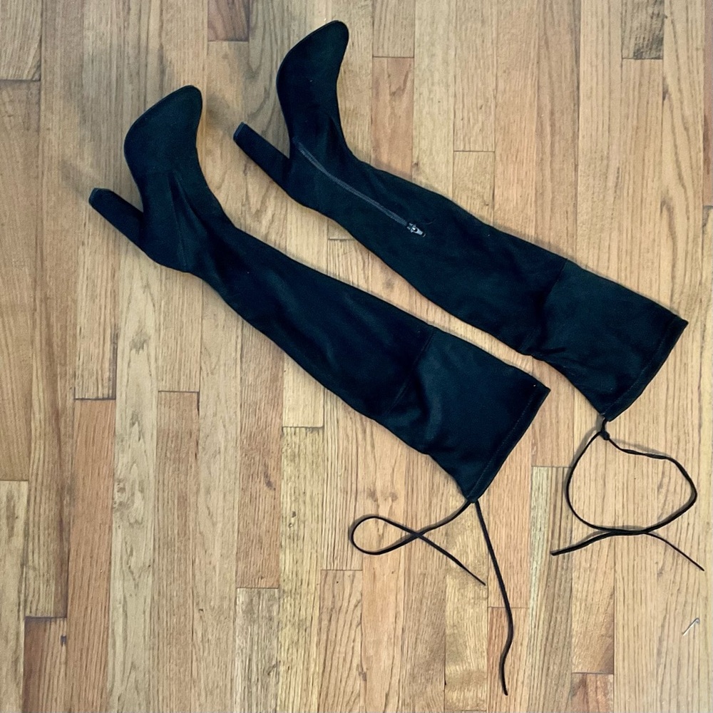 Thigh-high black suede heel boots